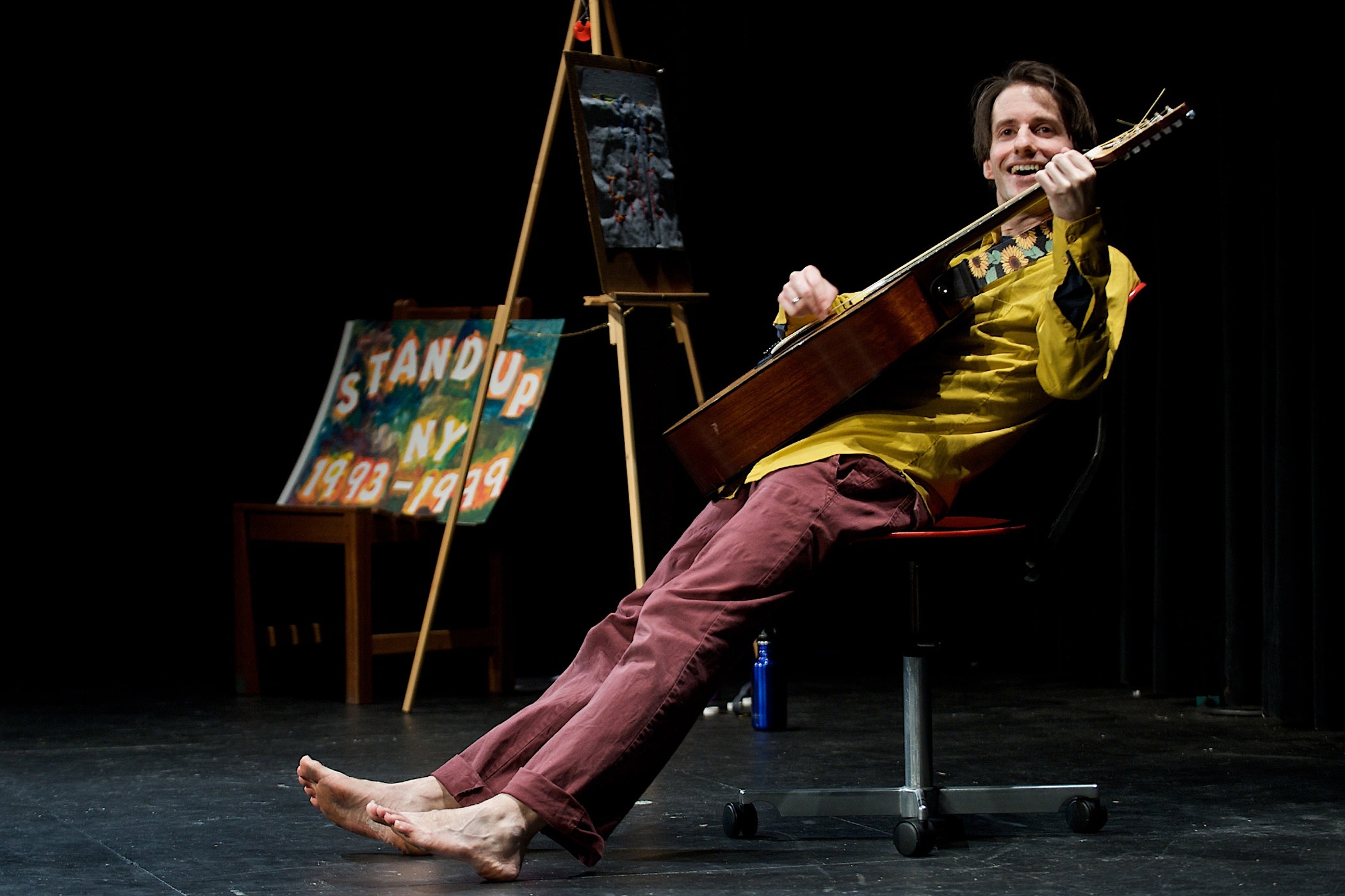 playing guitar in "28 FEET"