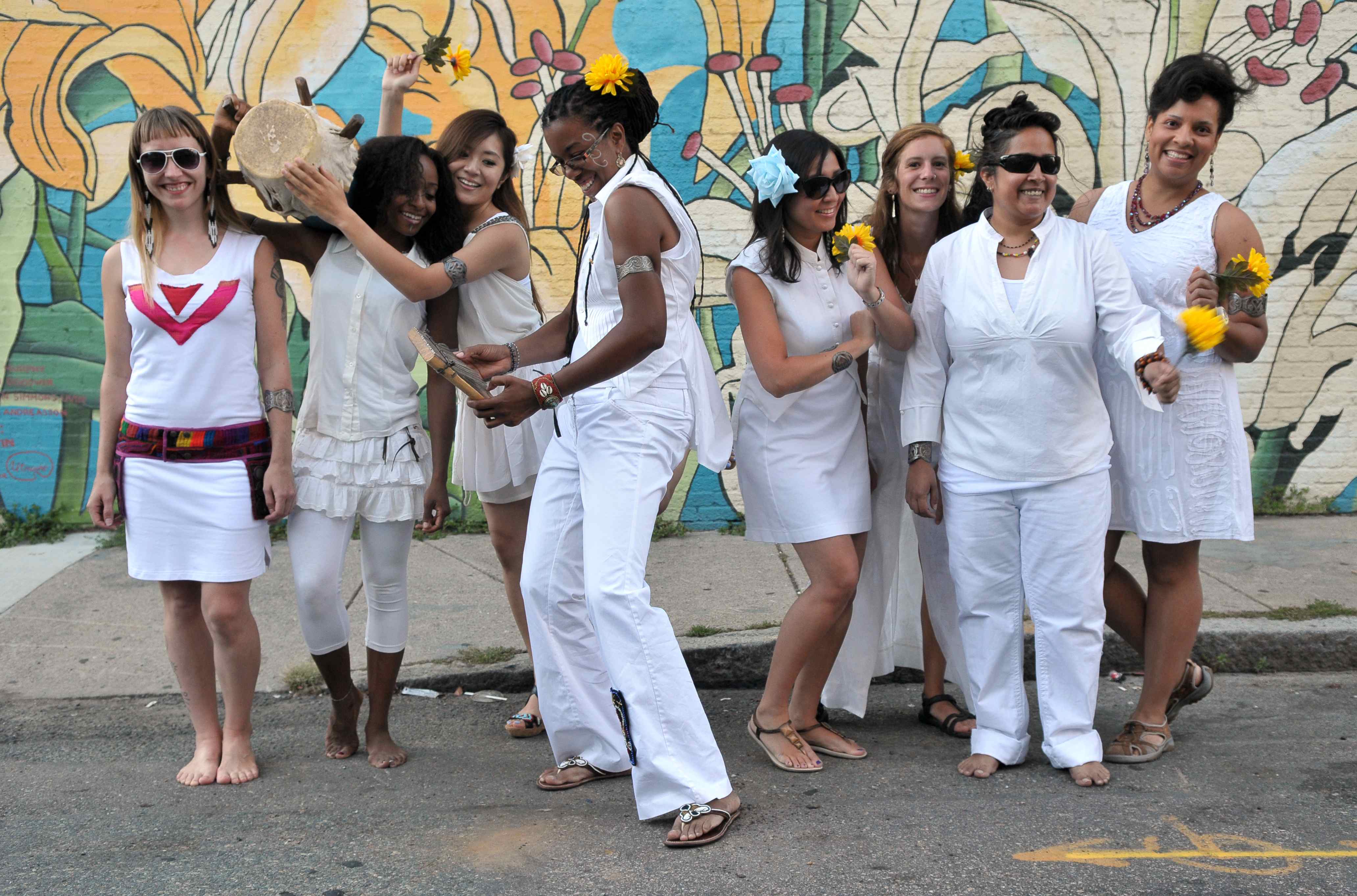 Zili Misik members, dancing and laughing 