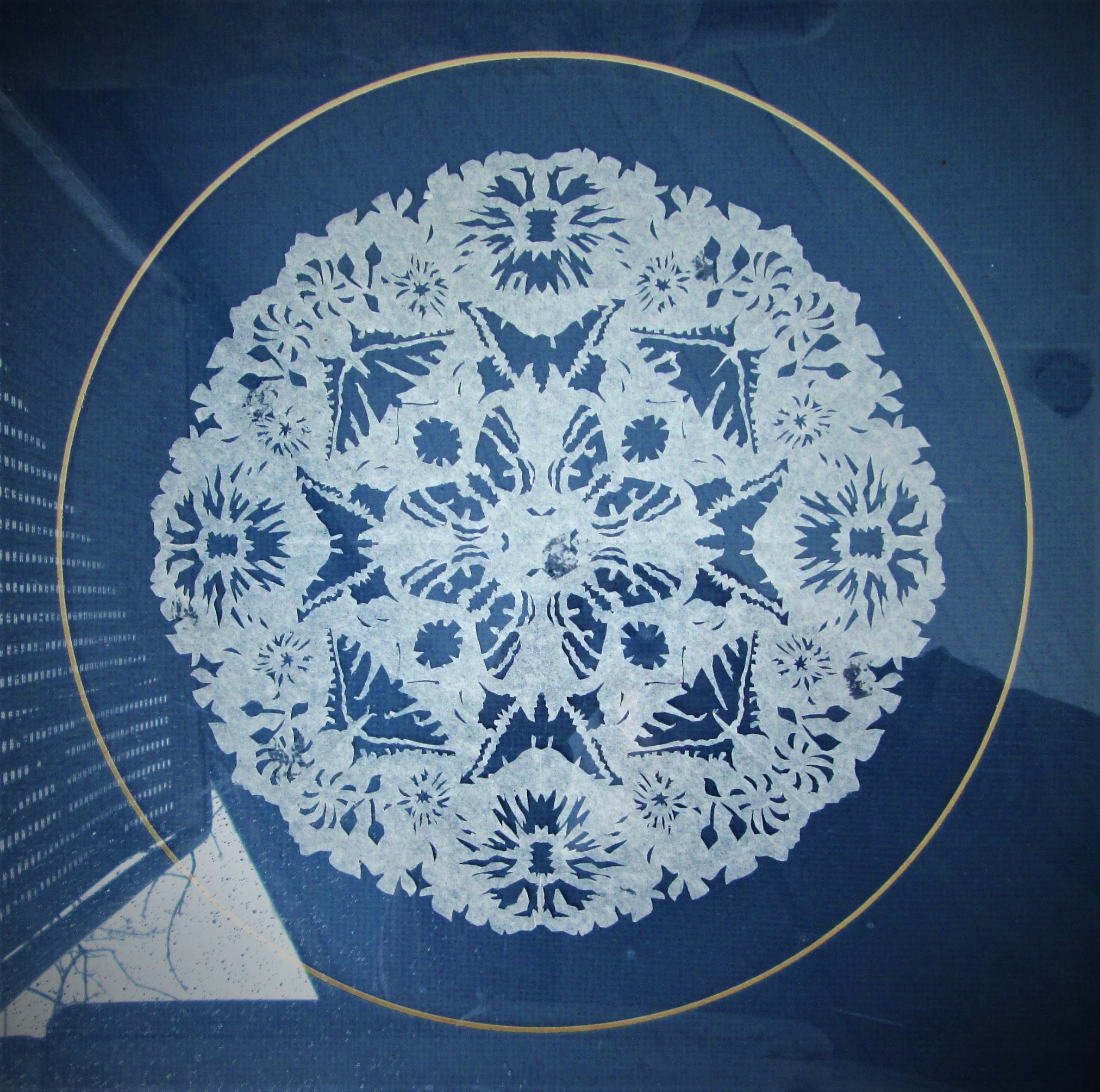 elaborate 16" papercut of tissue-paper