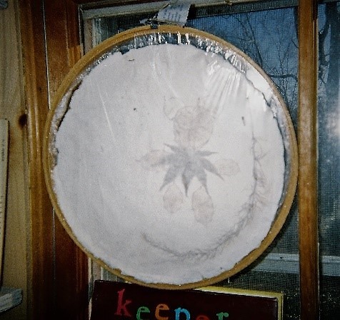 pictorial homemade paper in wooden frame