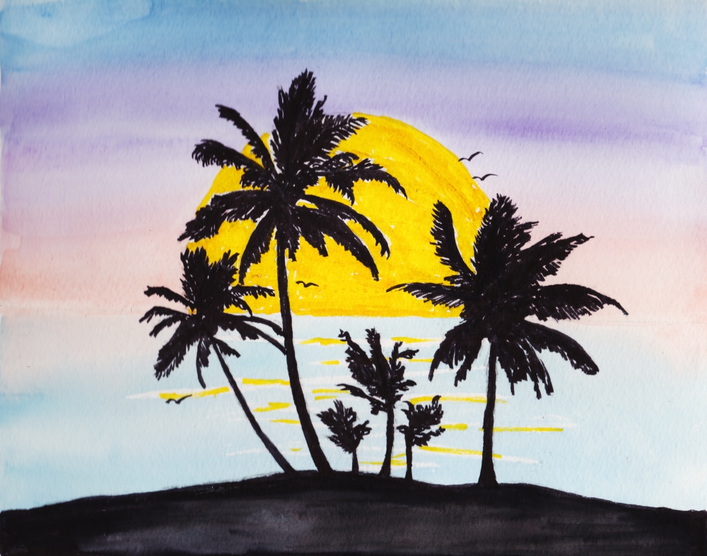 black palm trees in front of a setting yellow sun