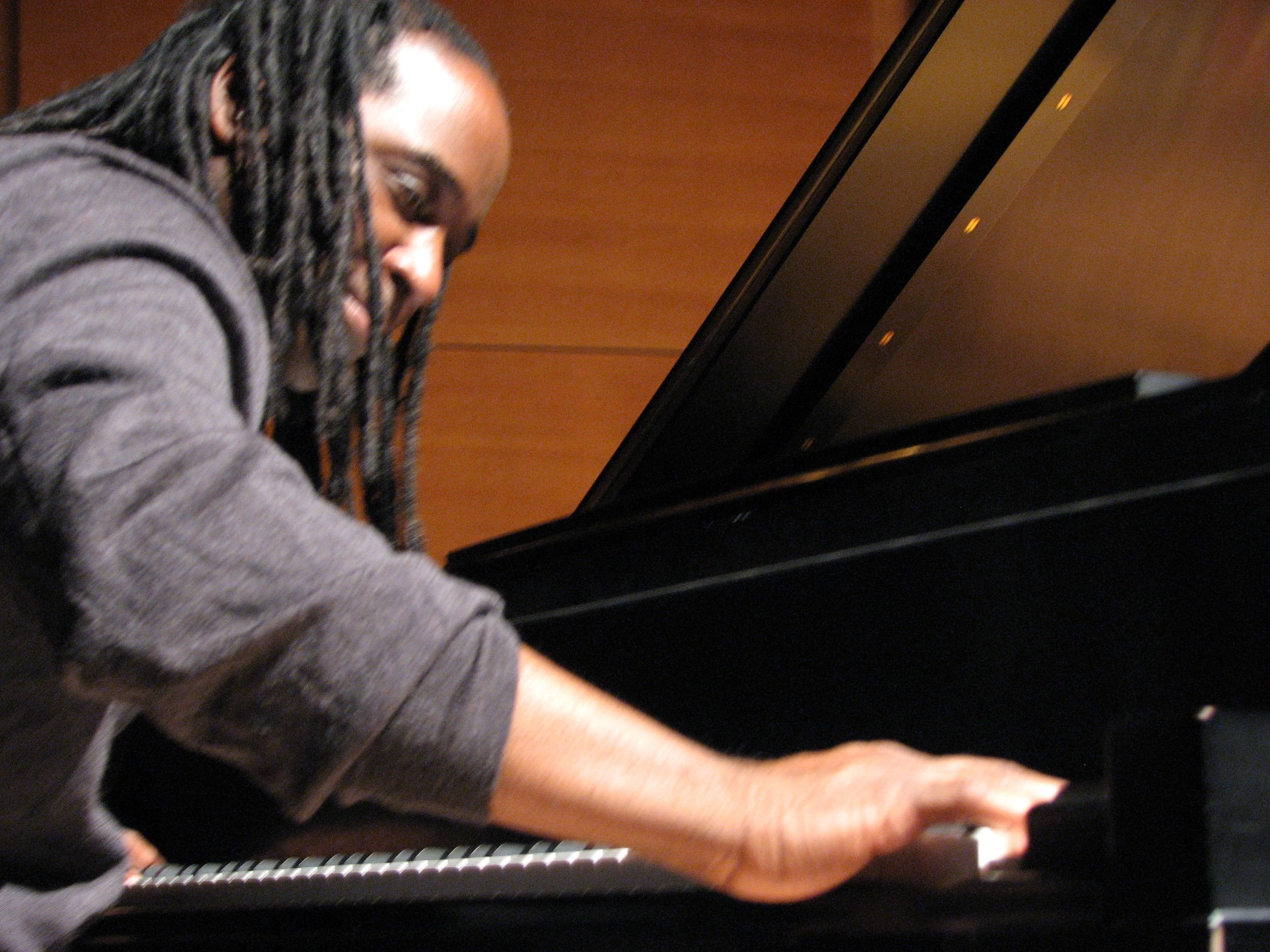 Joel LaRue Smith playing the piano