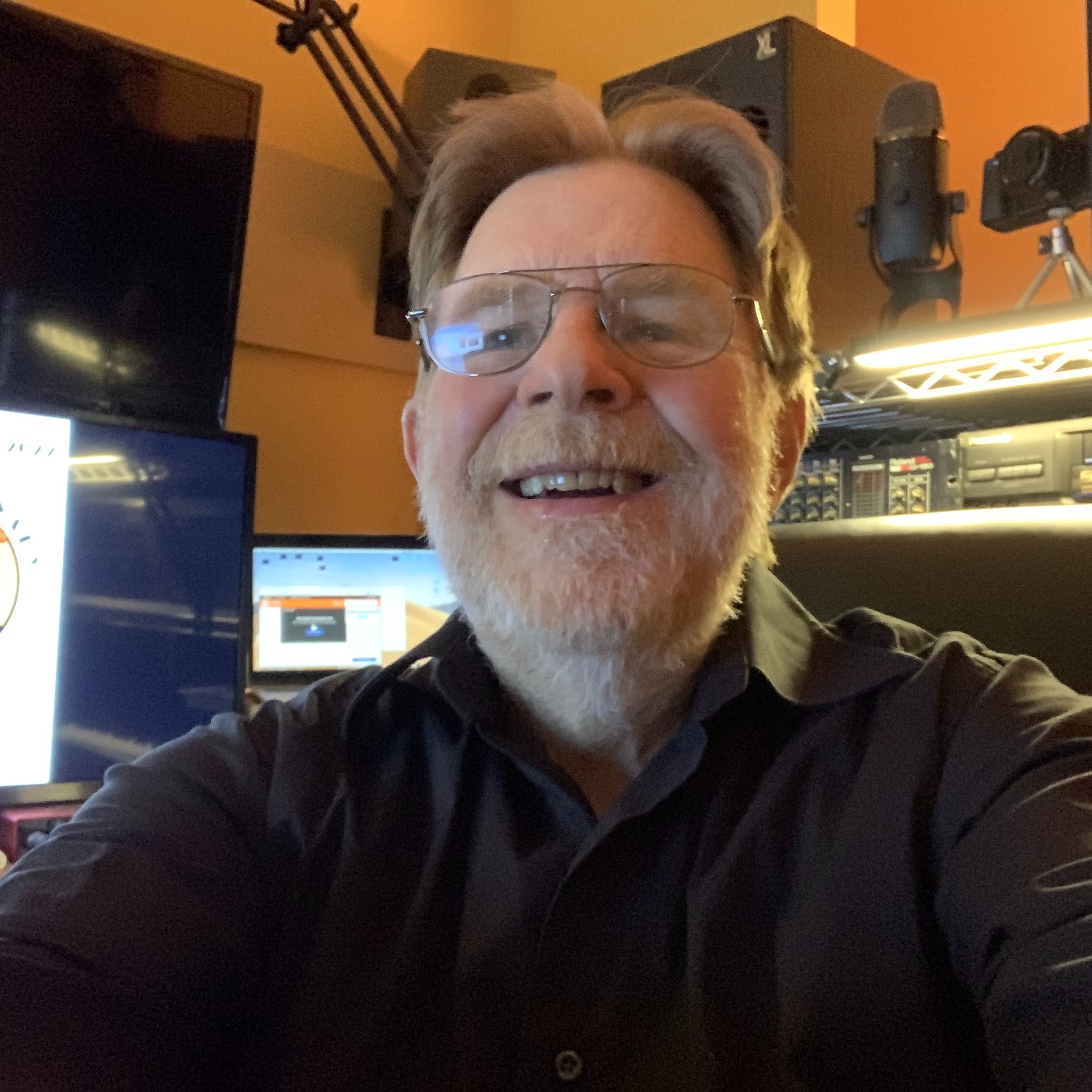 Photo of John in his studio.