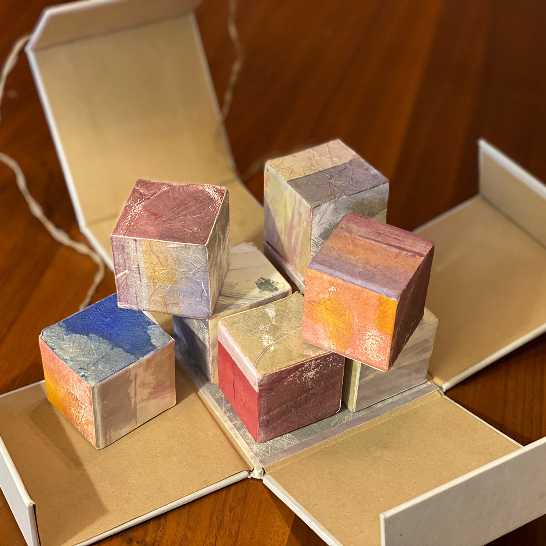 Open handmade 3D paper work, box: 4"X4"X4", Cubes: 1.75"X1.75"X1.75"
