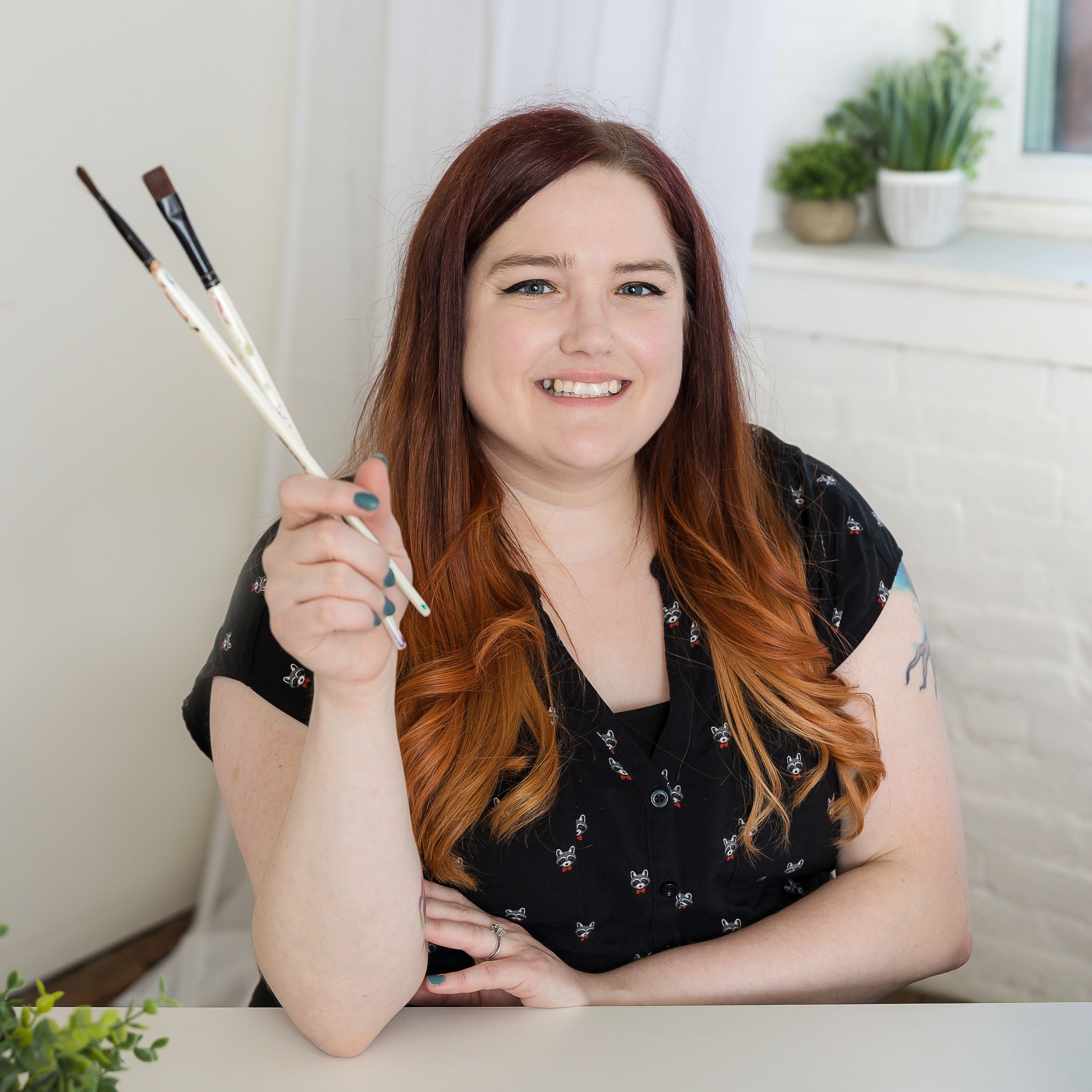Sarah Adams with Paintbrushes