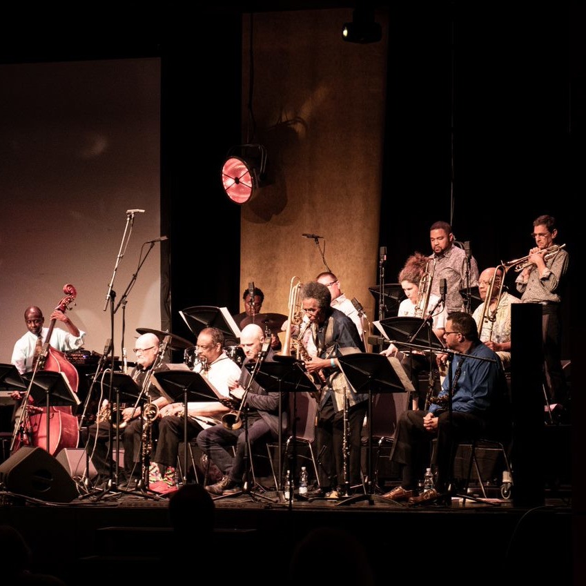 The Makanda Project front l to r: Avery Sharpe, Charlie Kohlhase, Chico Freeman, Sean Berry, Kurtis Rivers, Paavo Carey; rear l to r: Yoron Israel, Markus Eckl, Sarah Politz, Haneef Nelson, Alfred Patterson, Jerry Sabatini