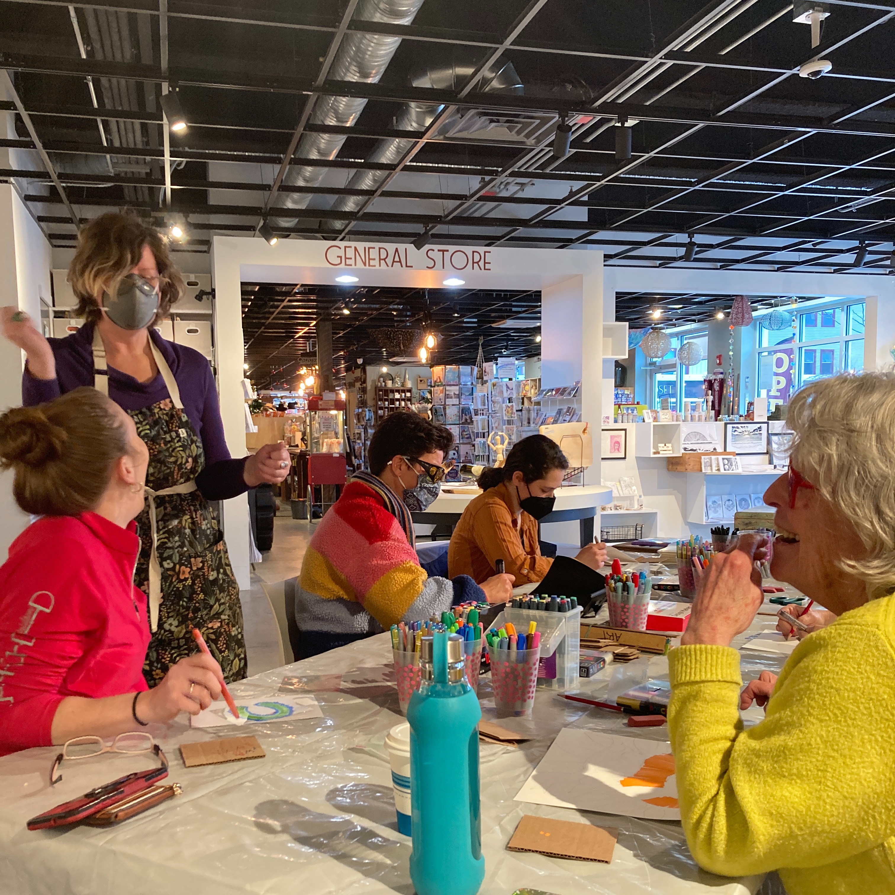 Instructor teaching a small group workshop