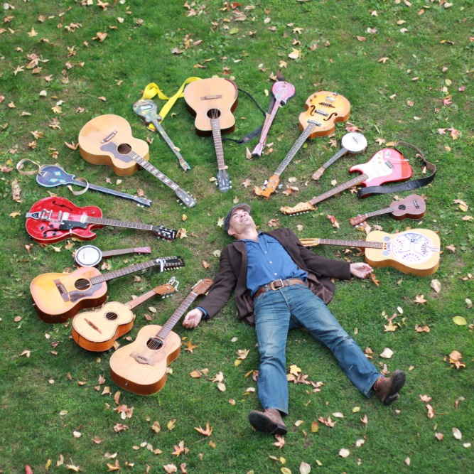 Laying in the grass in a circle of Guitar, I gaze at the sky and listen to the inner radio.