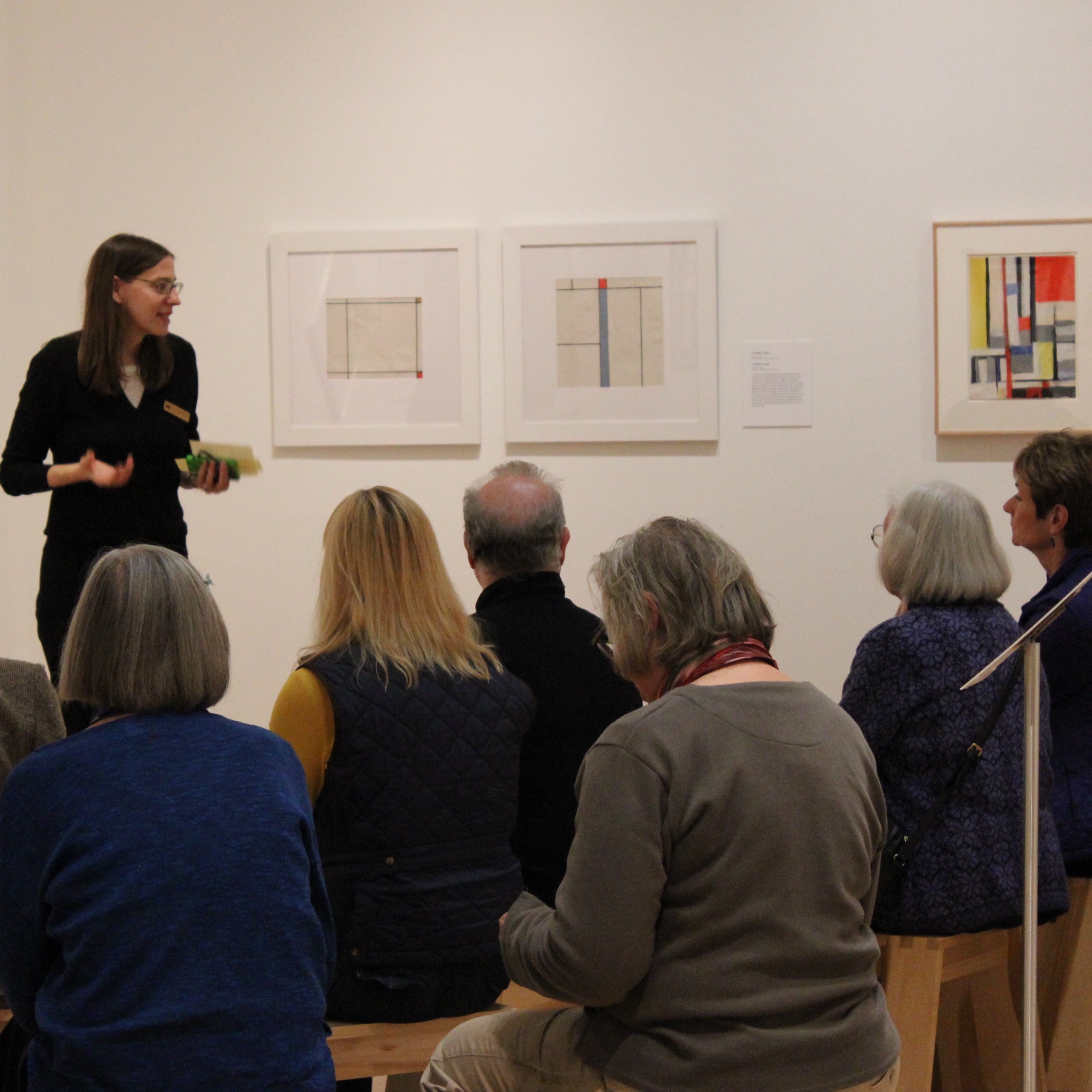 Curator giving lecture in gallery