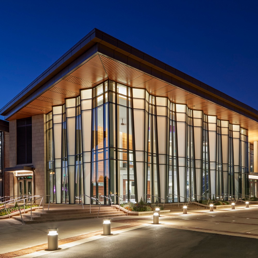 The glowing, transparent and translucent, undulating façade of the JSGPAC at Auburn University