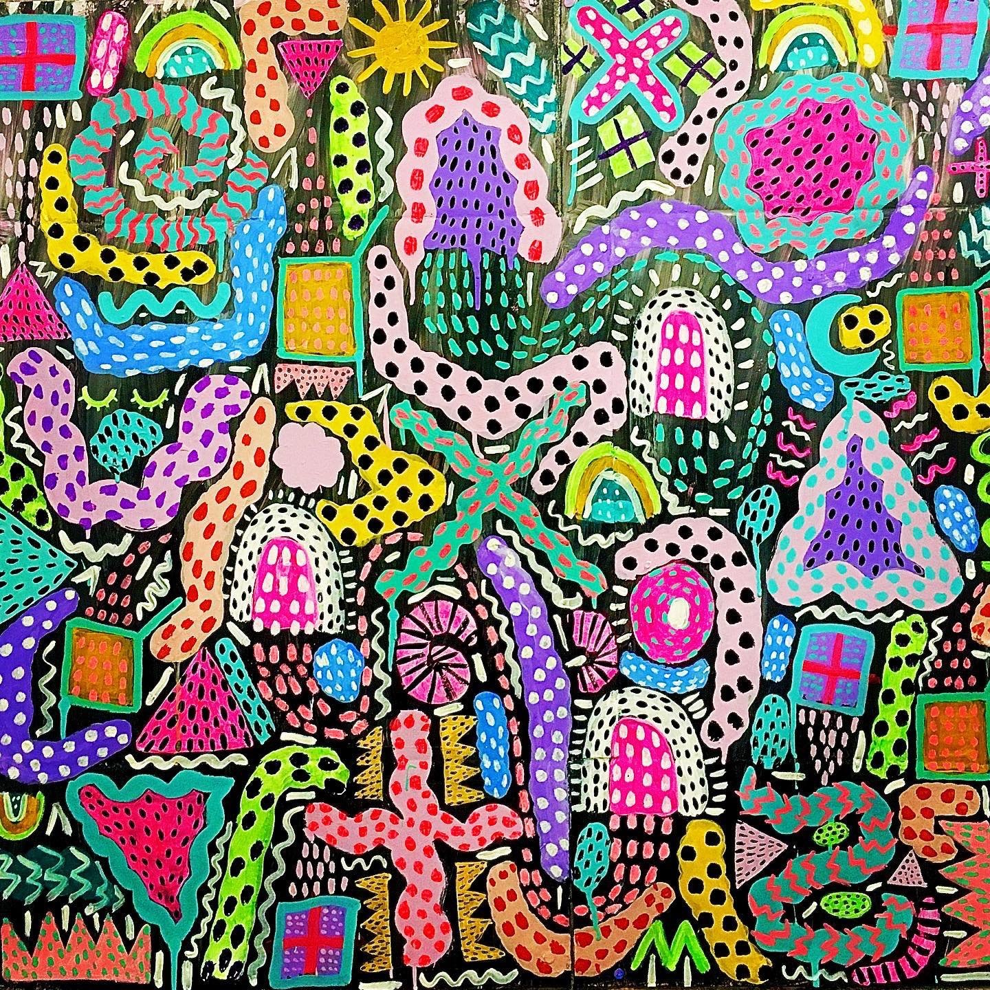 Acrylic painting of colorful shapes and patterns on a black background