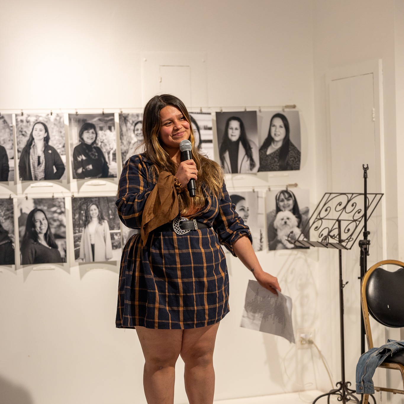 Writer reading poetry on stage