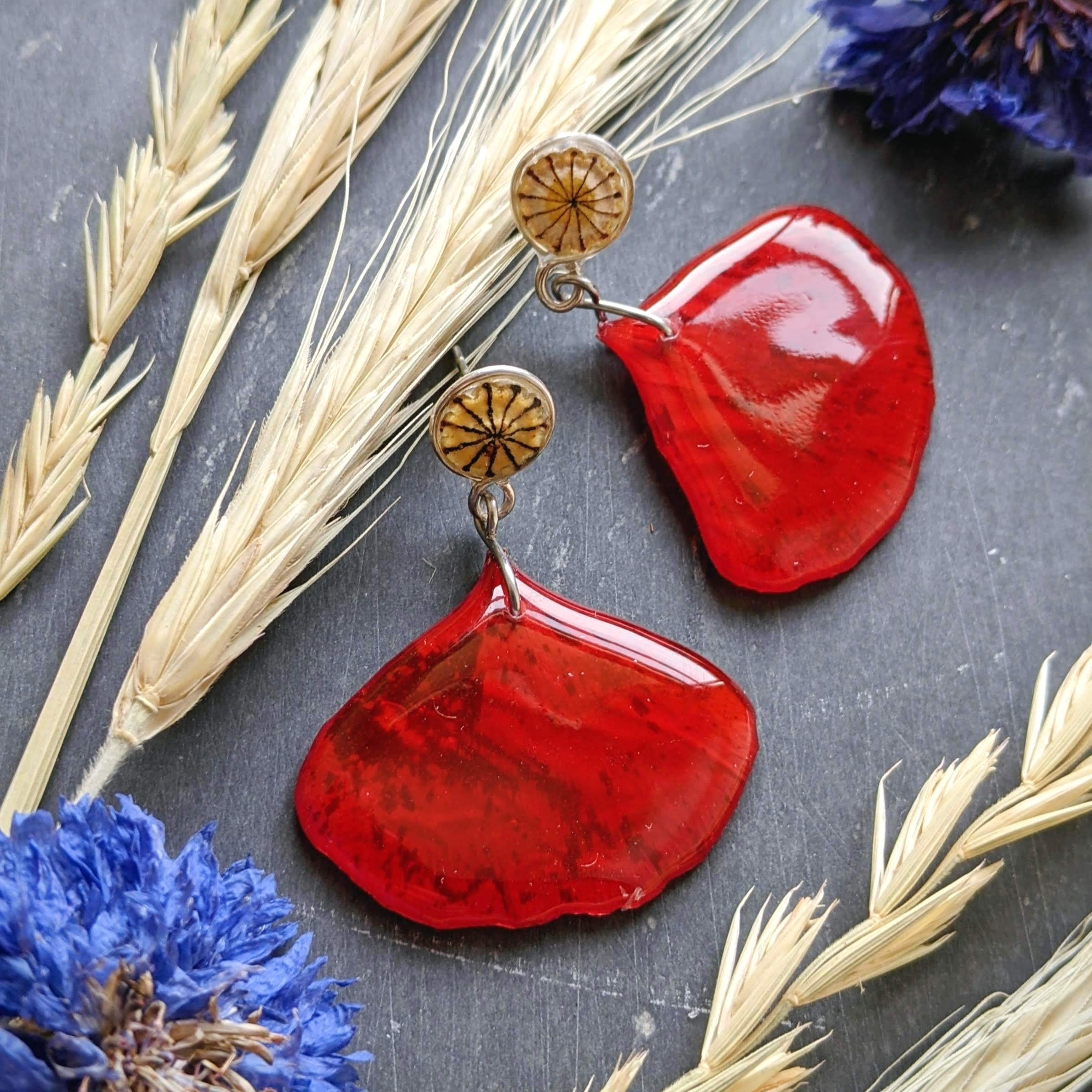 Red poppy petals earrings with the seed pod decorating the stud part
