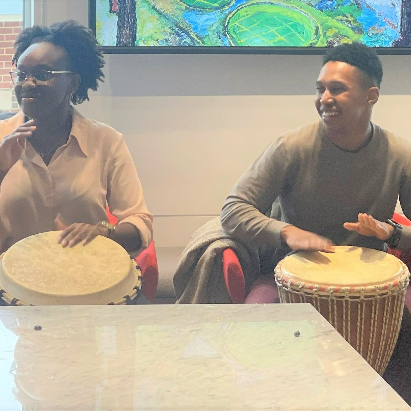 Drum circle at Bain Company, 2022
