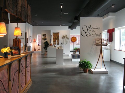 A gallery space displaying various forms of visual craft