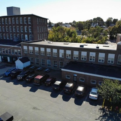 Our building on Western Avenue, as it appeared prior to the buildout which outfitted the interior as Lowell Makes' new home.